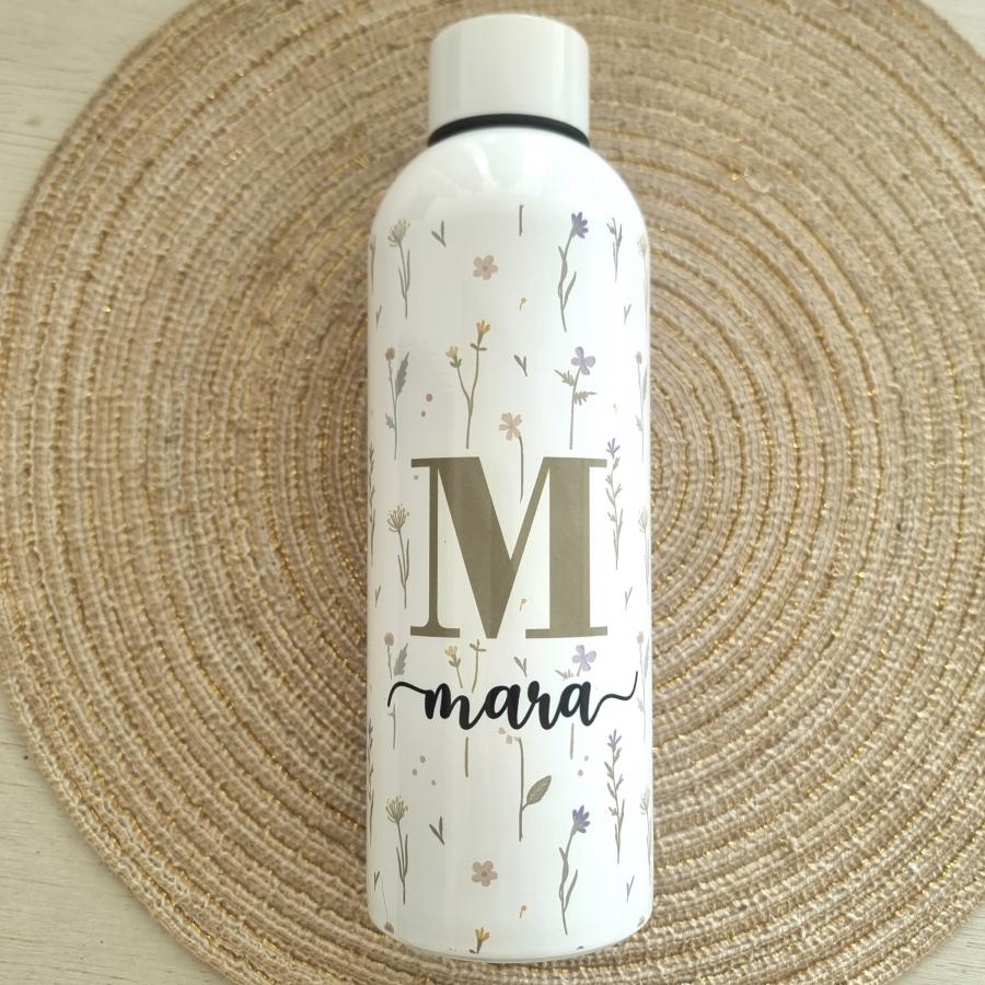 Botella flores de primavera.